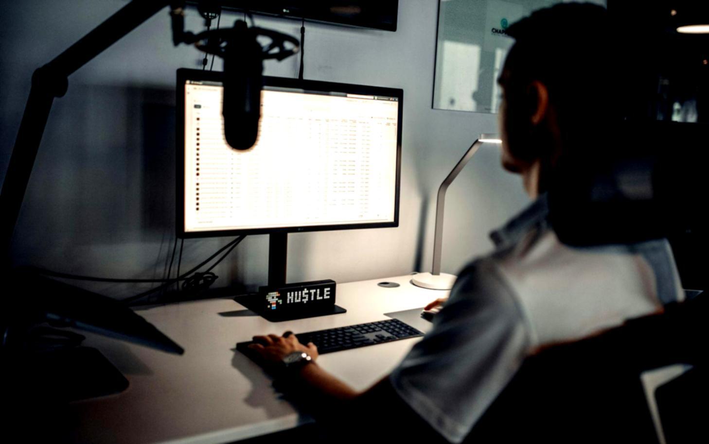 Strategic business meeting with investment documents and growth charts